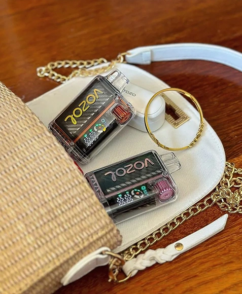 Vozol user enjoying a joyful vaping experience with Vozol e-cigarette